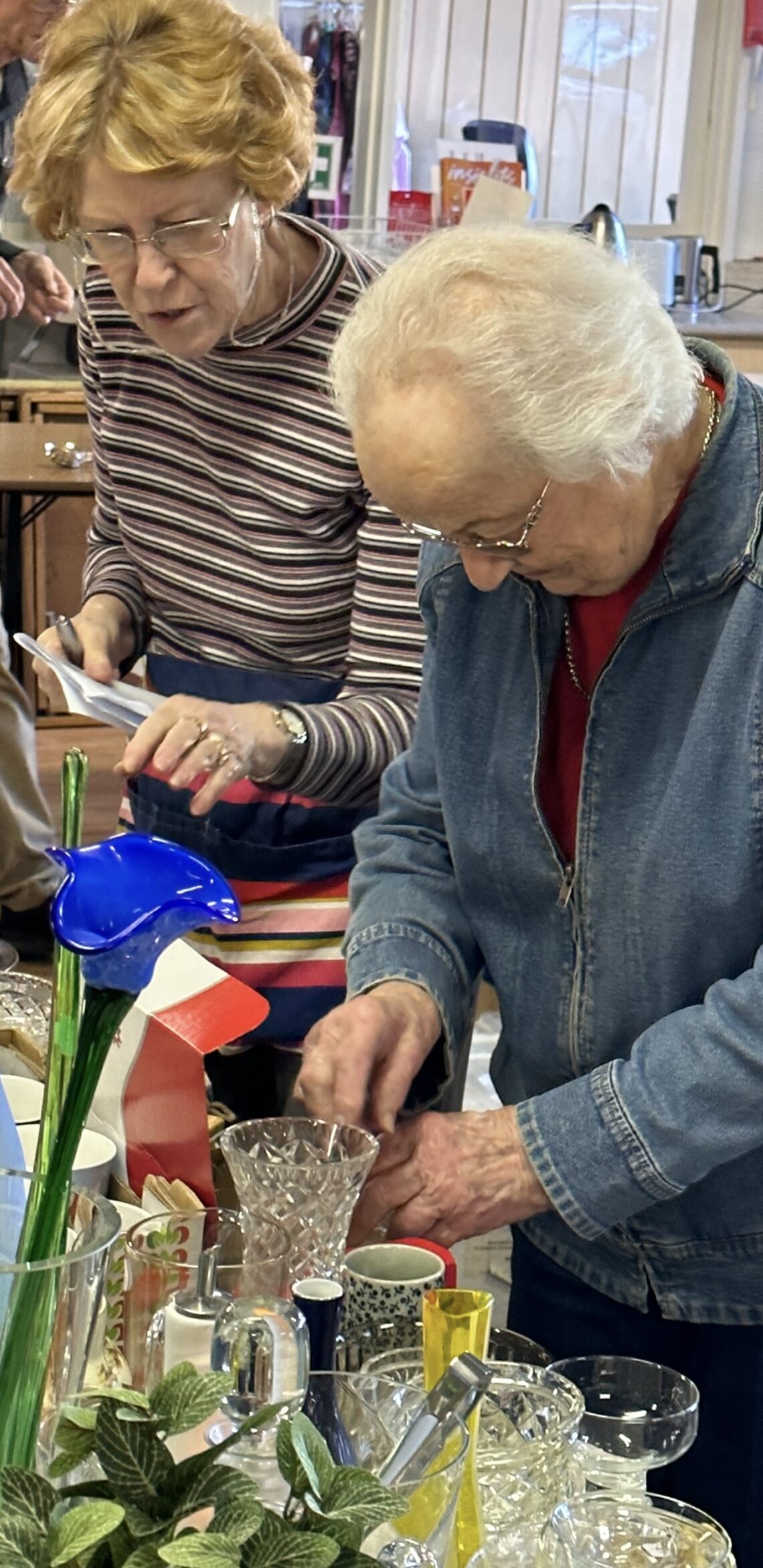 Photo of Lindfield volunteers sorting through donations