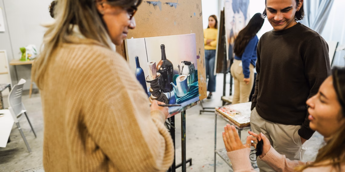 A group of people in an art studio.