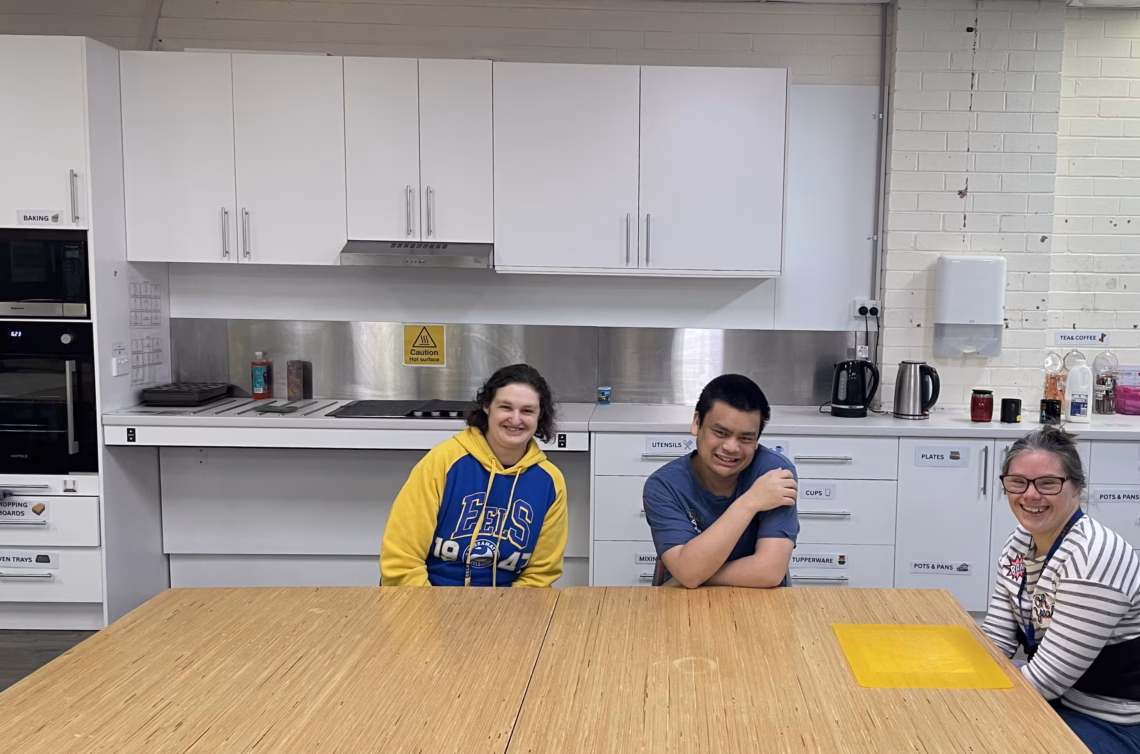 Picture: (left to right) Alicia Salter, Nicholas Barr and Orissa (Pickles) Jacyna enjoying the new kitchen.